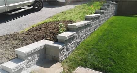 retaining wall installed as a fence